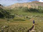 Nearing the lake that's below the pass.  The trail going up to Trail Rider pass is visible in the background.