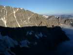 (2 of 4) The ridge leading up to Granite Peak.  The famed "Finger of God" tower is just barely being hit by the sun.