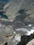 This is where I came on my first summit of Granite, back in 2001.  Around the lake, then up the snowfield to the saddle.  The drop below is incredible ... about 1800 feet down to the snow which is visible between the rocks.