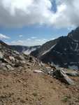 Mayela coming up the path to the Tempest pass, at 12,100 feet.  The side of Granite Peak is in the background.