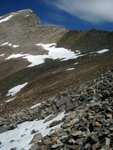 Looking at the summit as we climb past the last snowfield toward the ridge.