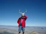 Brandon with some antlers we found off to one side of the summit.