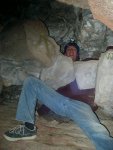Cool rock formation that we found at about -120 feet.  The rocks are kept in place by being squeezed together horizontally.  Brandon is actually on about a 45-degree incline above me.