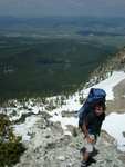 Stephen nearing the top of the ridge, an unnamed lake from the adjacent eastern basin below him.