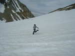 Stephen, taking large running steps down across the snowfield.  8-10 feet between steps was not uncommon.