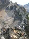 Nate getting to the summit ridge, and realizing there's nothing on the other side, except a 900-foot drop to the lake!