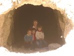 In the mouth of a mining tunnel just off the road.