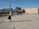 Oscar demonstrating how to play volleyball, Mexican style.