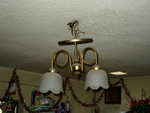 More electrical weirdness... the dining room light fixture in our house, just hanging out...