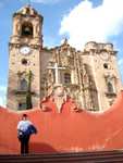 Mayela at a cathedral in Guanajuato.  They ran out of money before they could finish the right-hand side.  That's OK, 'cause there's lots of gold inside.