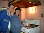 Paul and Mayela in the kitchen, back "home" at her grandmother's house.