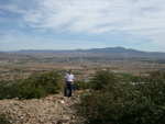 Oscar at the top of the first foothill, with the town of San Felipe in the background.