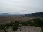 Counter-clockwise panoramic shot #2.  Some of the nearby foothills, and some fields.