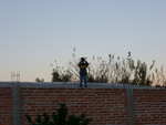 Some kid who was spying on us from the roof of his house, captured for posterity.