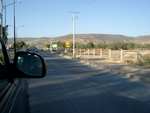 Road on the way out of Leon.  To the right are the city soccer fields...you can spot a few goalposts.
